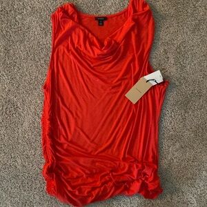 Top with ruched side.